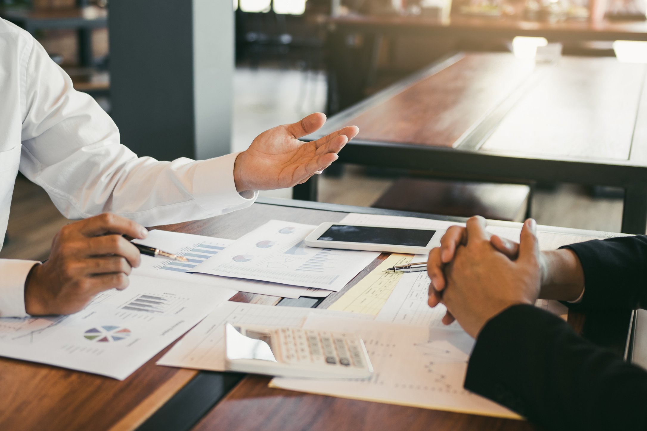 Managers Discussing Company Finances